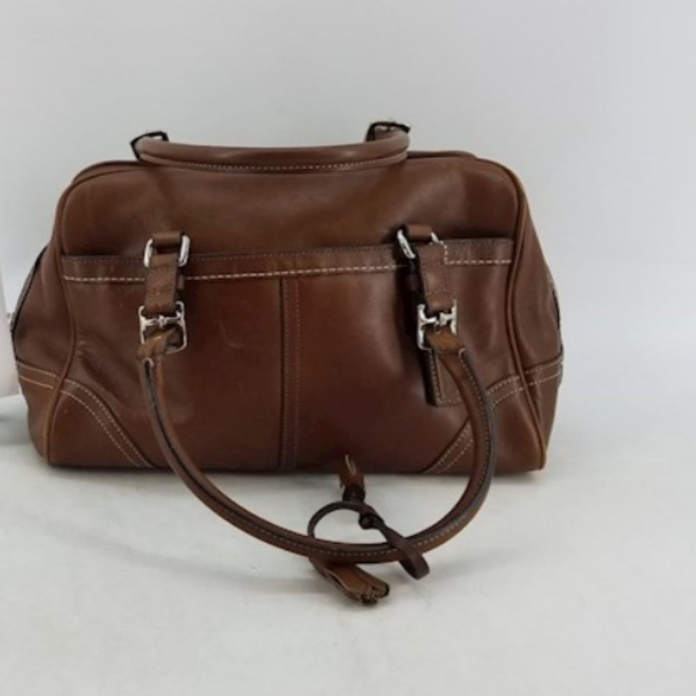 Brown leather coach purse
